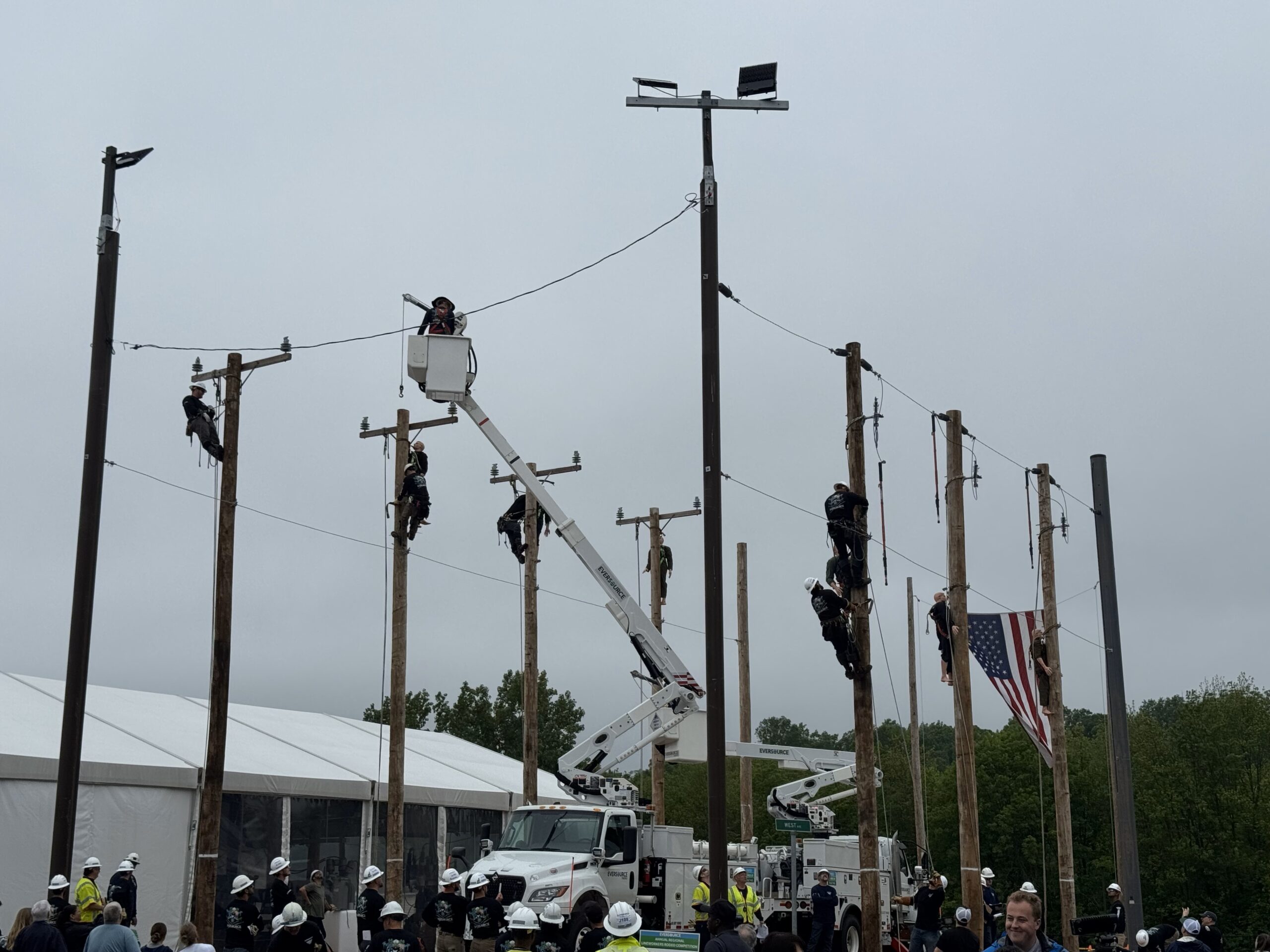 Eversource Regional Rodeo Linemen on Poles